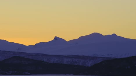 faraway mountains and sunset panorama from northern norway