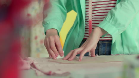 dressmaker working in her studio.