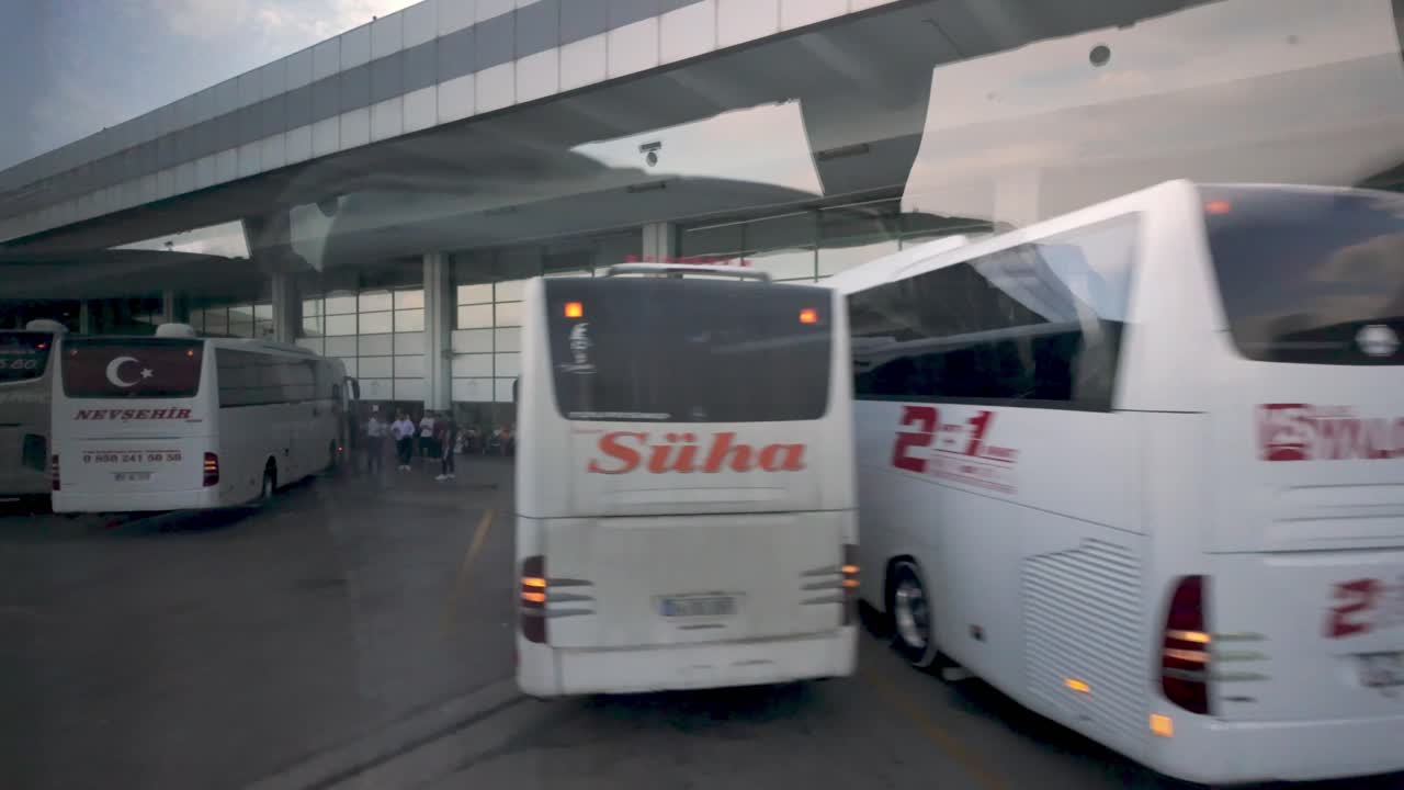 Ankara Bus Terminal scene, showing buses ready for trips across Turkey, including to Konya and beyond.