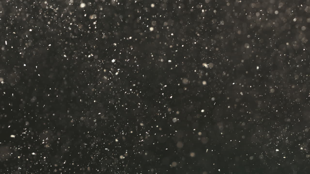 어두운 배경에서 추상적인 입자