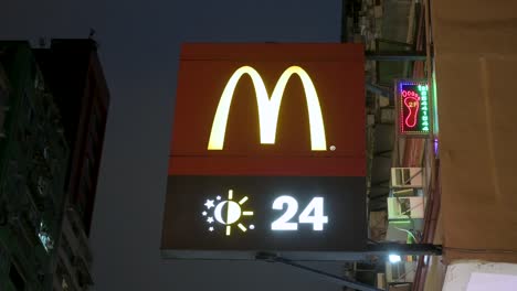 McDonald's 24-Hour Sign at Night in Hong Kong