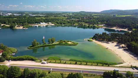 Kryspinów-Reservoir,-with-sandy-beaches,-clear-waters,-and-lush-greenery,-a-beautiful-summer-recreation-spot,-Budzyn,-Poland