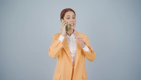 Angry-talking-business-woman-on-the-phone.