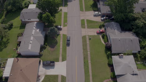 flyover suburban neighborhood and street with a crosswalk