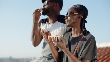 Slow-motion-of-gays-enjoying-meal-and-admiring-cityscape