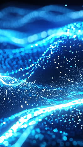 the image is a blue wave with a lot of glitter on it. the glitter is scattered all over the wave, giving it a sparkling and ethereal appearance. the blue color of the wave