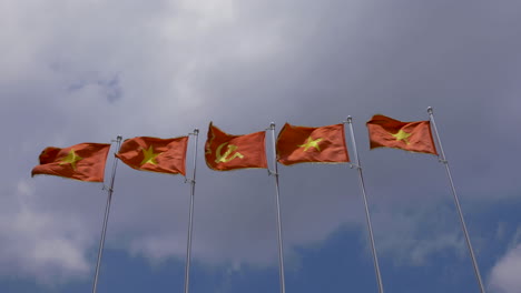 4k video of national flags of vietnam with a flag of communist party of vietnam or cpv