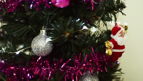 Left-to-right-moving-shot-of-christmas-tree-decorations