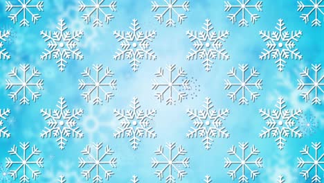 Animation-of-falling-snowflakes-on-blue-background