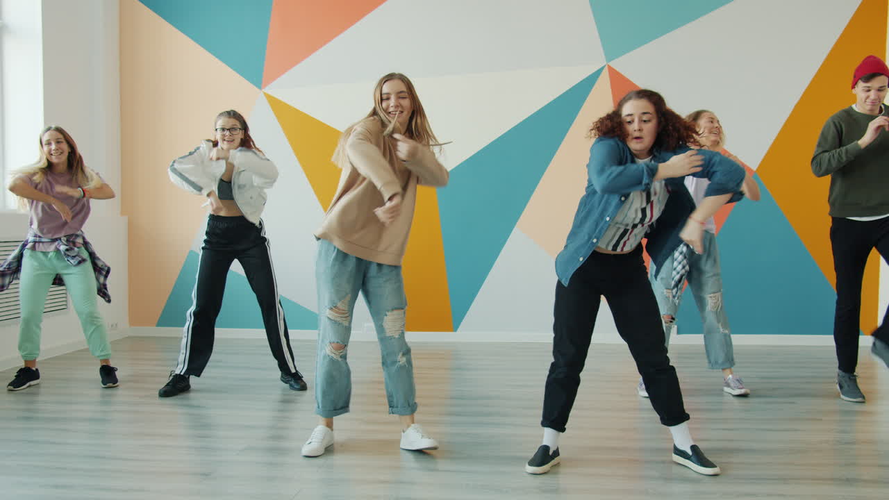 Teenagers Dancing in a Dance Studio