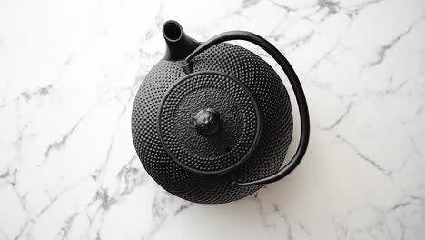 Black-metal-oriental-teapot-isolated