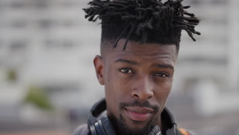 close up portrait confident african american man looking up independent black male funky urban style