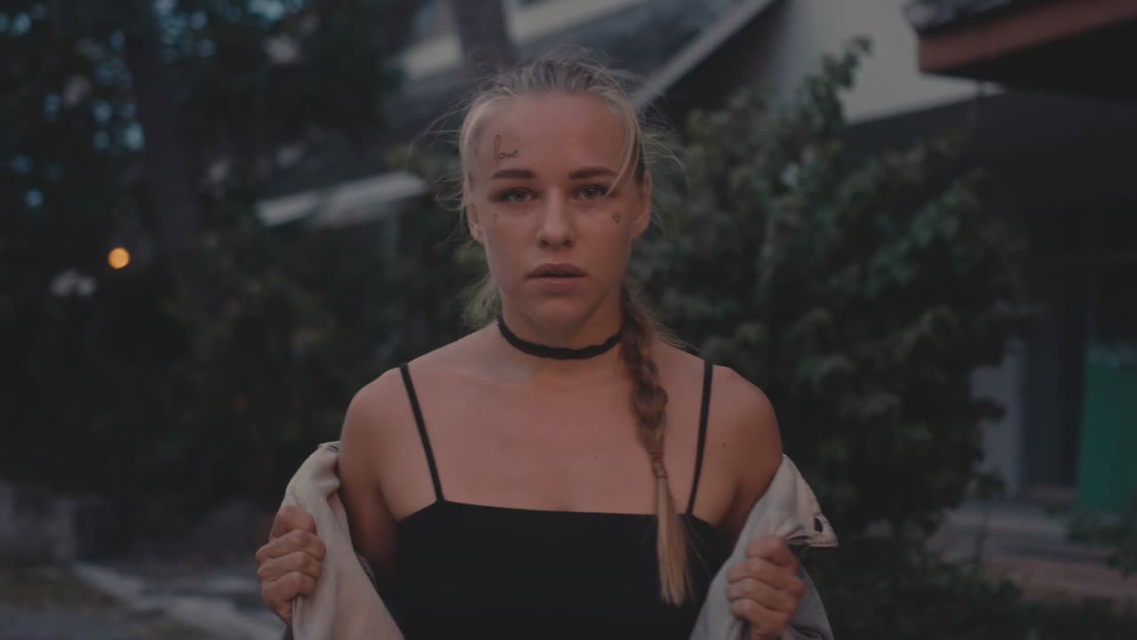 Young Woman in Urban Setting