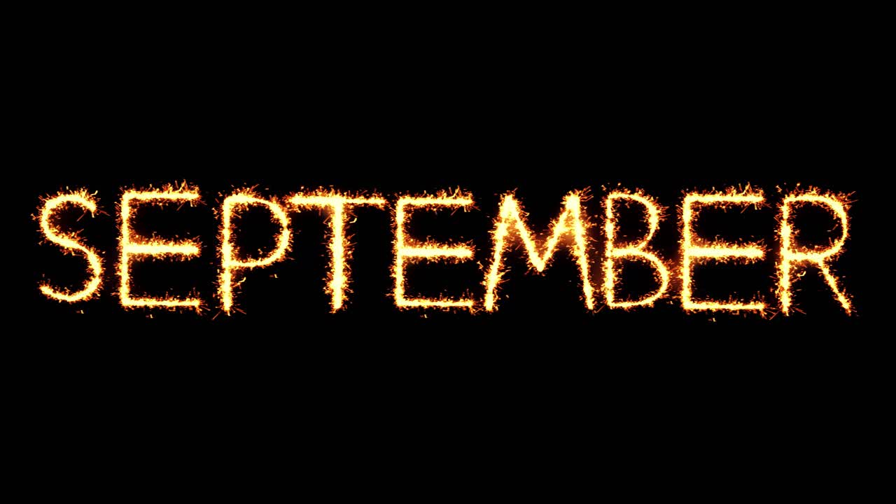 September text sparkler writing with glitter sparks particles firework on black 4k loop background