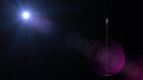 animation of light and vintage microphone on black background