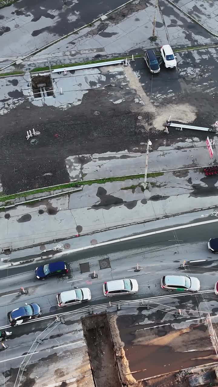 Vertical shot of Purvciems, Riga, with traffic flowing through the urban streets.
