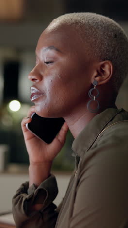 a businesswoman talking on the phone in an office setting