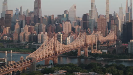 new york city's queensboro bridge at sunrise