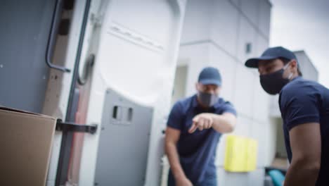 video of couriers unloading packages during a pandemic