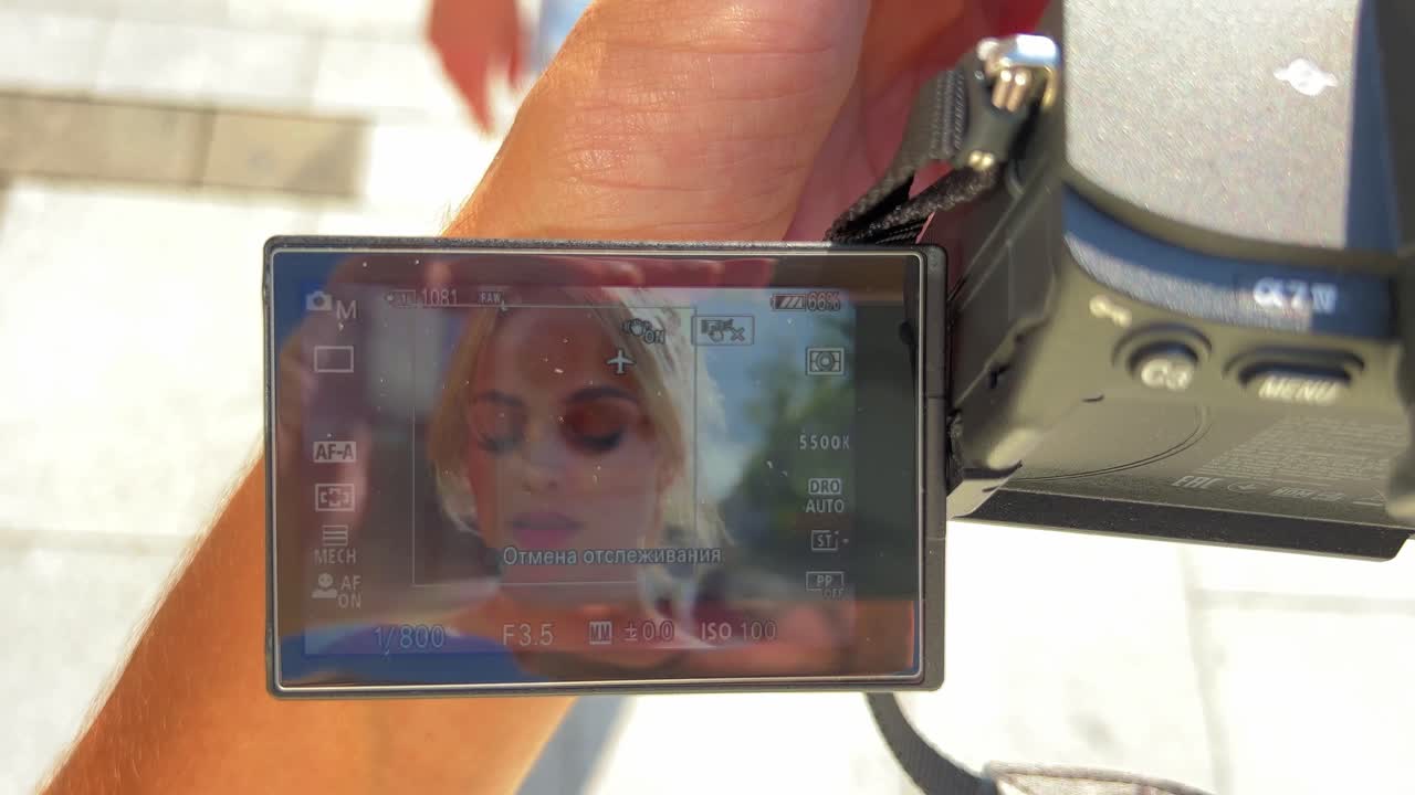 Woman on camera screen