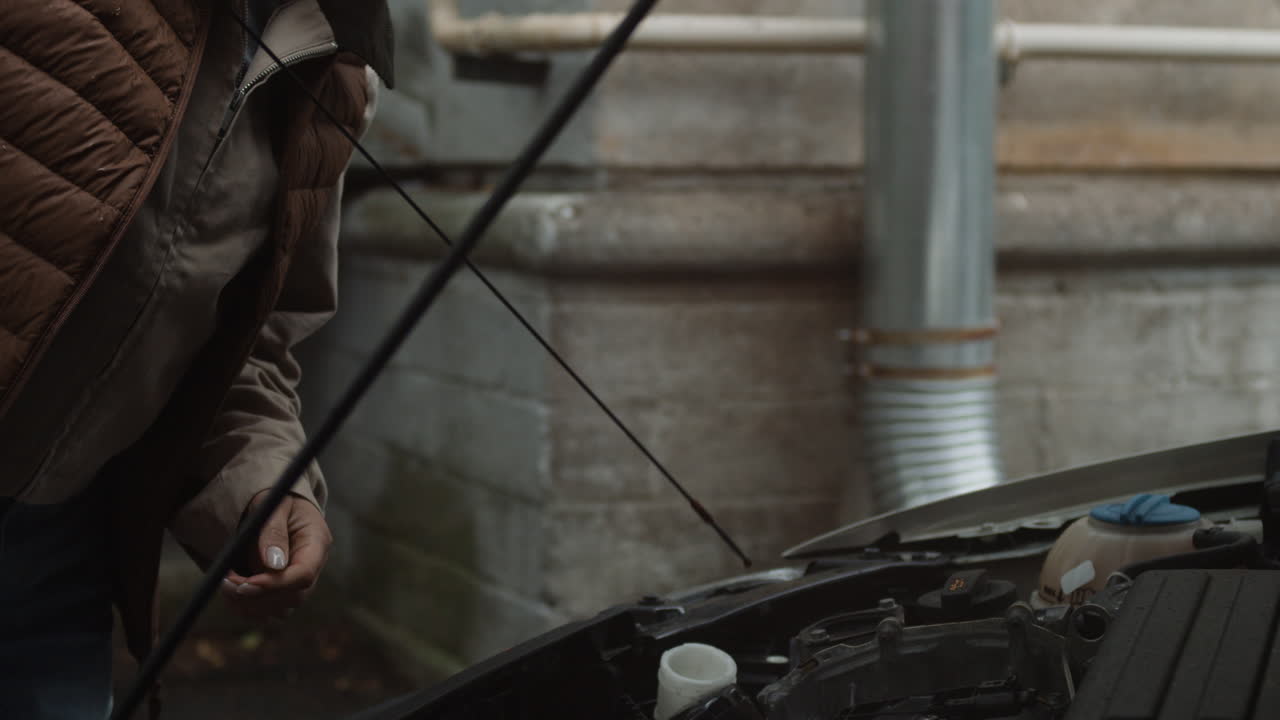 Checking car engine oil