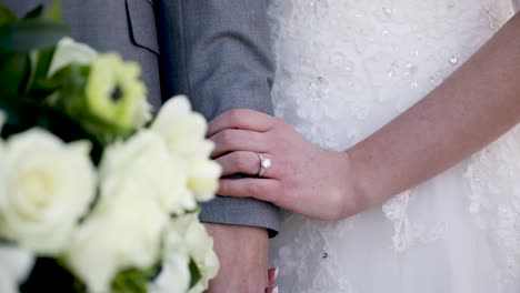 Bride-and-Groom-Holding-Each-Other-on-Wedding-Day---Marriage-Concept