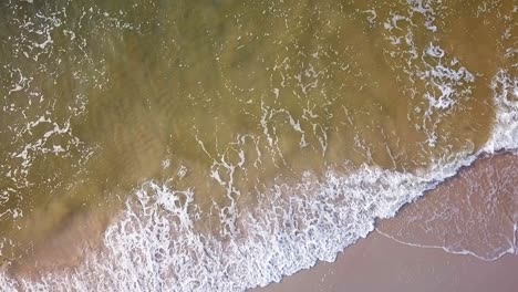 Aerial-View-Of-Sea-Waves-On-Sandy-Beach-Of-Baltic-Sea