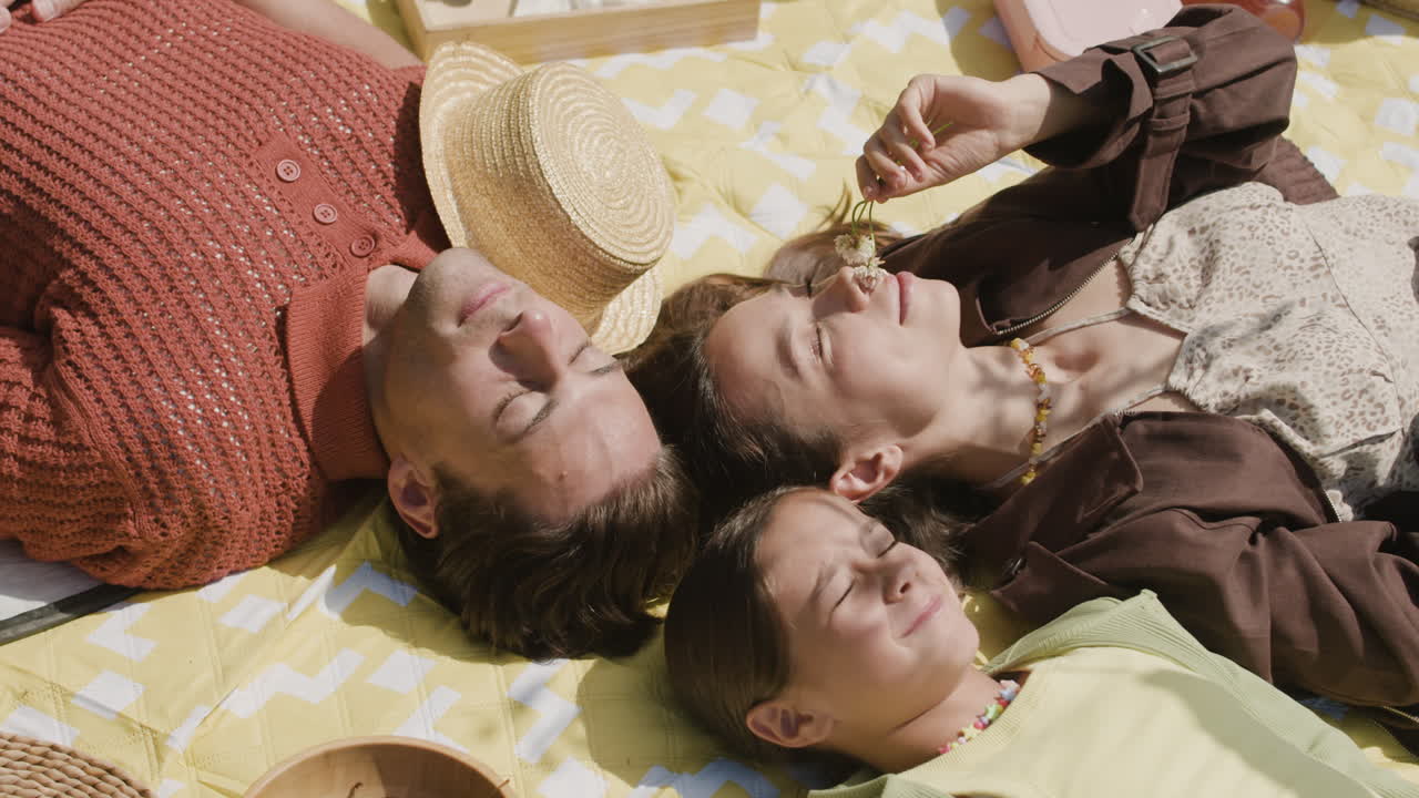 Family relaxing during a picnic