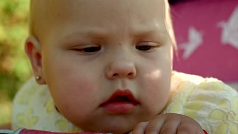 baby girl sitting a pink bunny