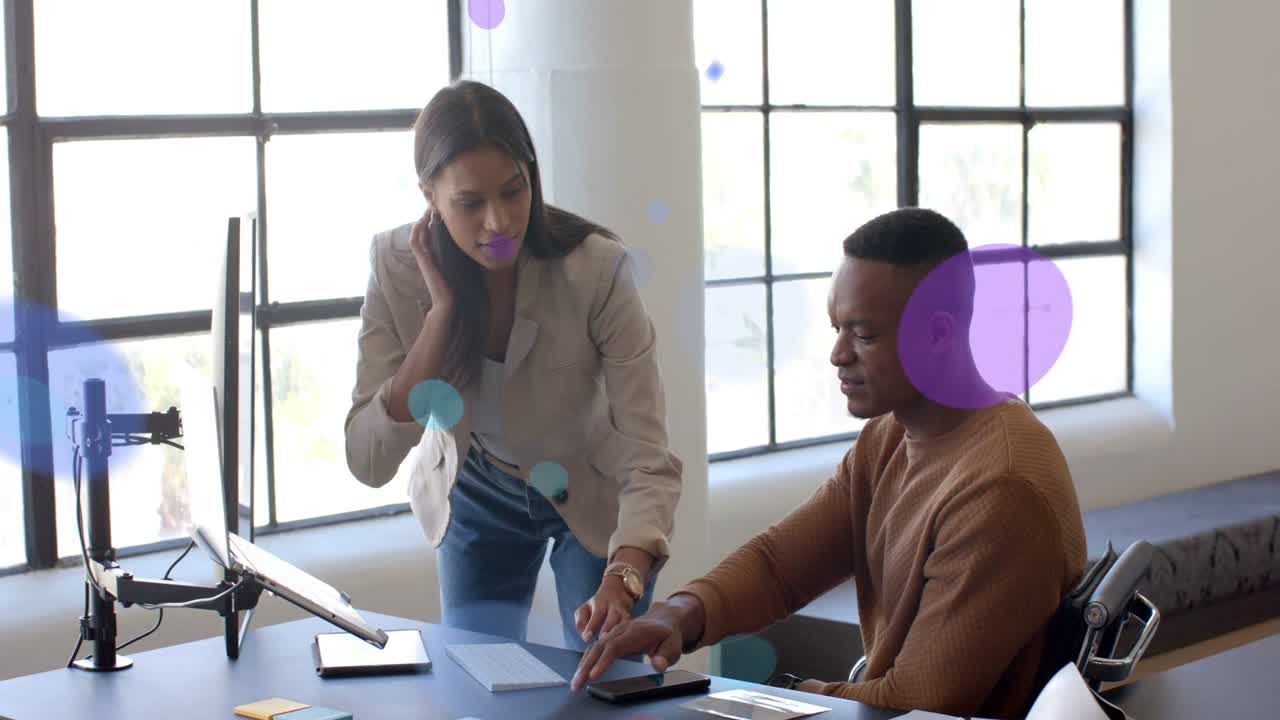 Woman tapping tablet and man reaching device business team working while circles obscuring people