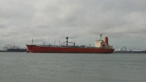 large commercial ship moving up waterway