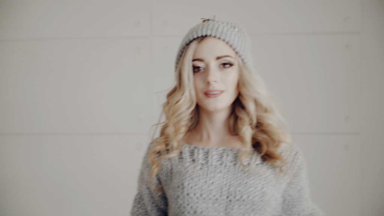 Stylish woman in studio. Young stylish woman posing in studio