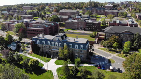 aerial: flying toward sir howard douglas hall on the university of new brunswick fredericton campus