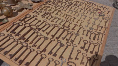 variety of antique keys being sold in local market in spain
