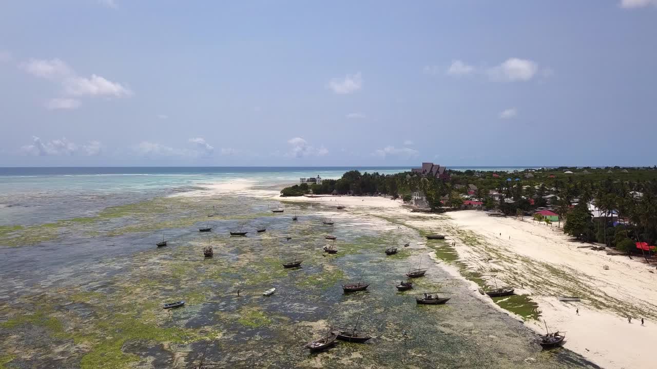Aerial View of a Tropical Beach with Boats in Zanzibar, Tanzania