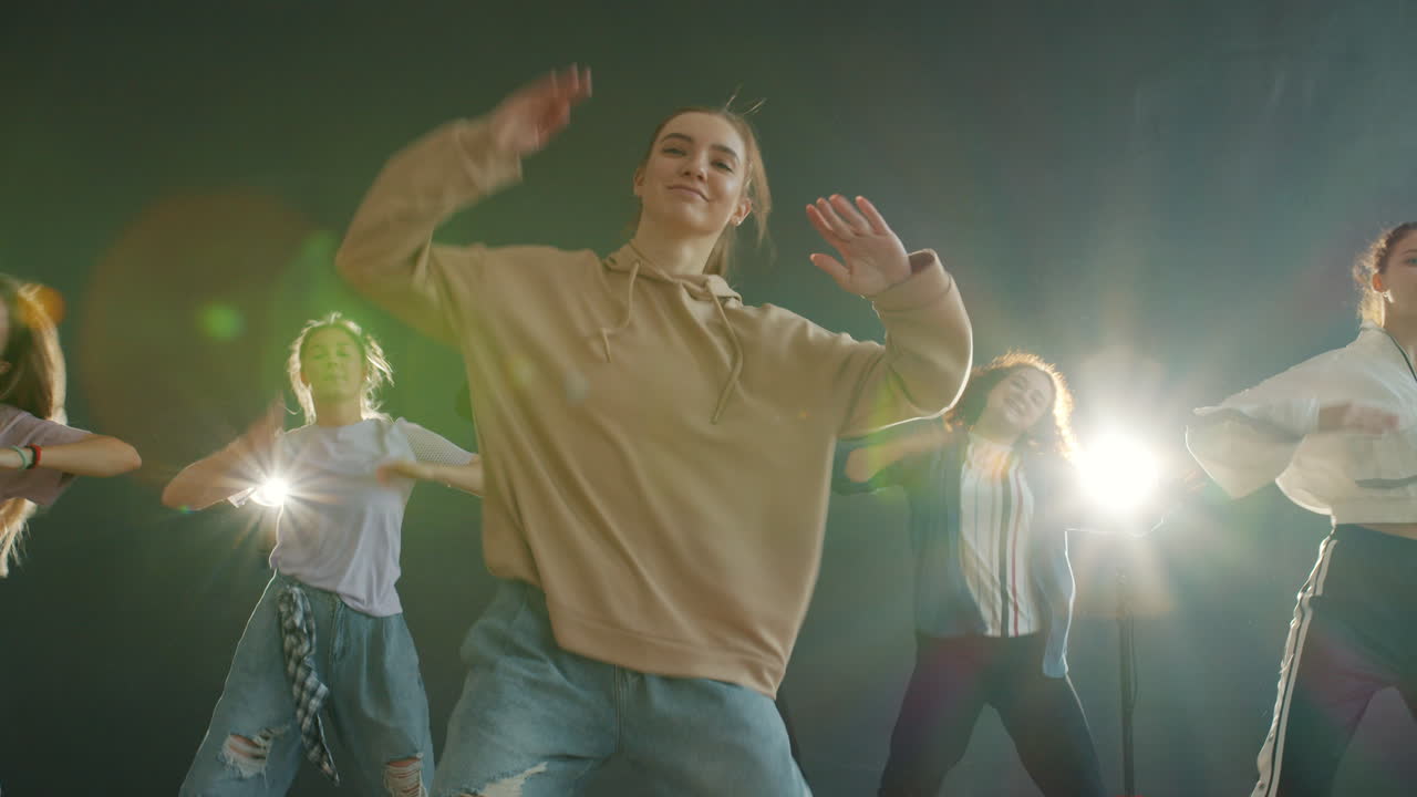 Group of young adults dancing