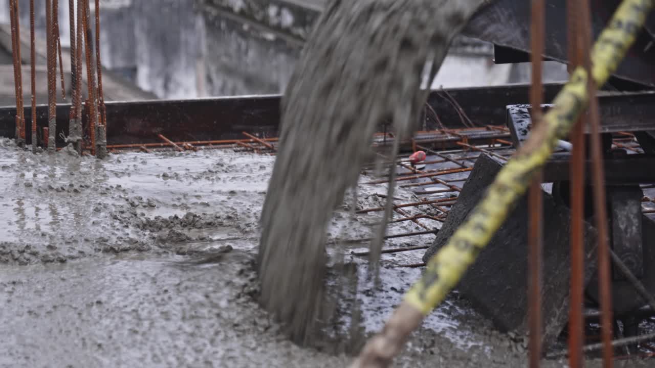 M20 grade Concrete mixture pouring on slab at construction site. day time, stable shot, close up shot, 4k