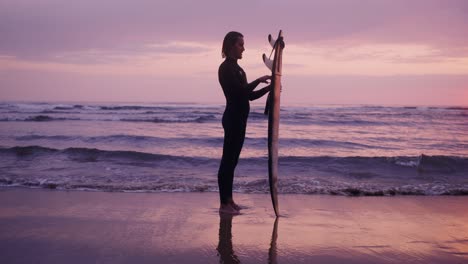 surfer at sunset beach