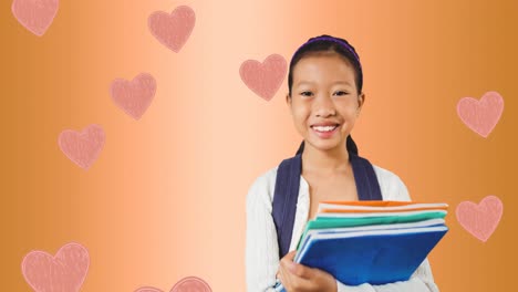 animation of schoolgirl over multiple heart on orange