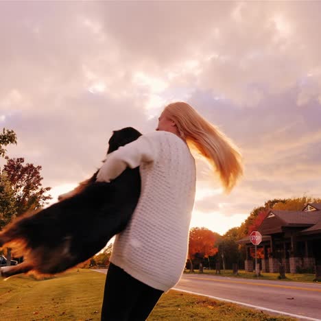 Una-Mujer-Joven-Juega-Con-Un-Perro