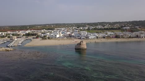 famous torre pali in puglia, italy. aerial panoramic circling view