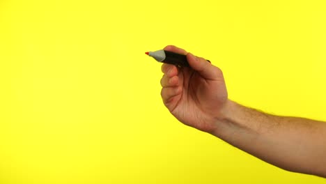 hand writing on yellow screen. hand drawing with a red marker pen on a yellow screen background.