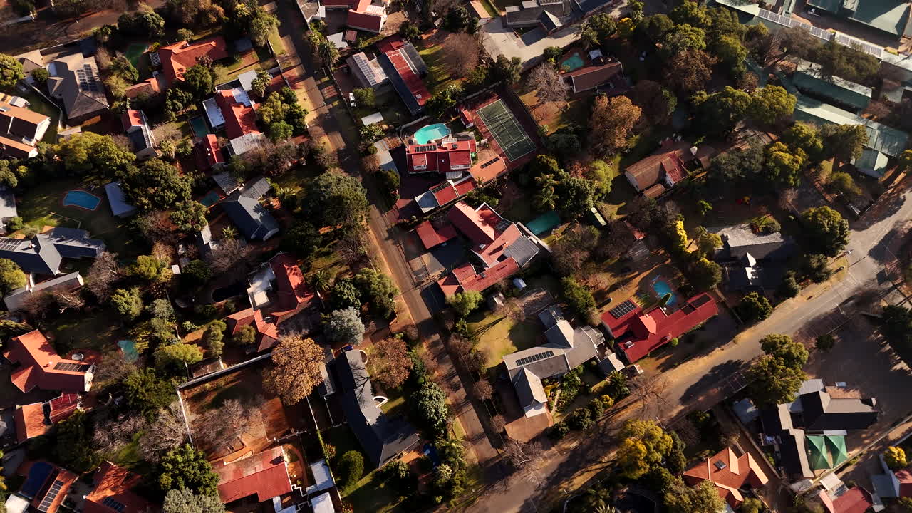 Top down aerial view over Johannesburg neighborhood with large erf properties
