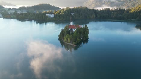 low clouds over lake bled in the autumn