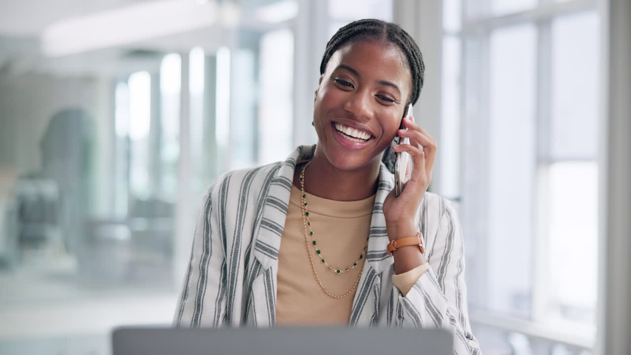 Businesswoman on a Phone Call in an Office