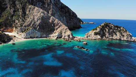 aerial view of the rocky mountains at the shore of agia eleni in kefalonia, greece