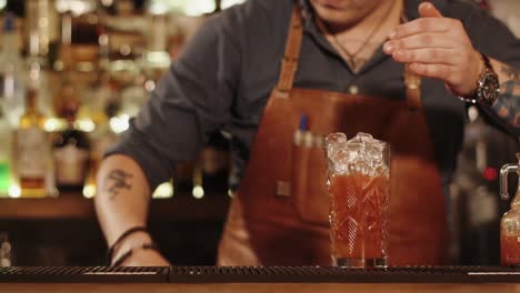 bartender preparing a cocktail