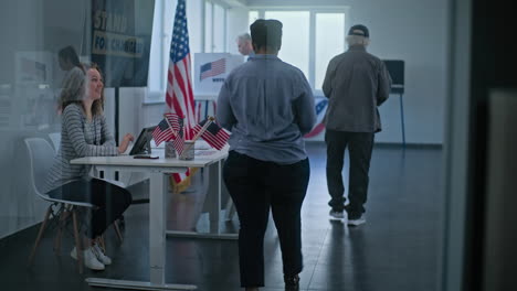 people voting at a polling station