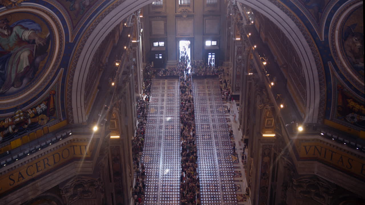 High Angle View of a Large Crowd Inside St. Peter's Basilica