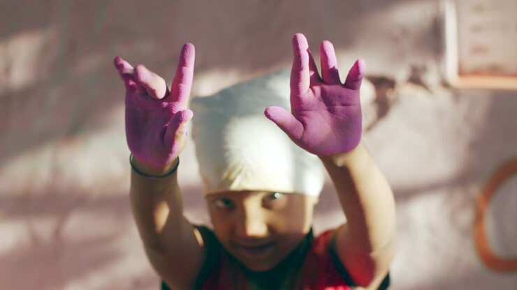 Kids celebrating the Hindu festival of Holi in Rajasthan, India